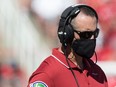 Nick Rolovich, former head coach of the Washington State Cougars talks with officials during their game against the Utah Utes Sept. 25, 2021 at Rice Eccles Stadium in Salt Lake City, Utah.