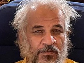 This handout picture provided by the Baghdad Operations Command of the Iraqi Army provided on October 11, 2021 shows Sami Jasim al-Jaburi, the alleged finance chief of the Islamic State group, arrested by intelligence services 'outside the borders' of Iraq.