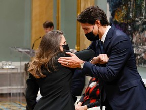 Canada's Prime Minister Justin Trudeau greets Deputy Prime Minister and Minister of Finance Chrystia Freeland during the swearing-in of the 29th Canadian Ministry at Rideau Hall in Ottawa, on October, 26, 2021.