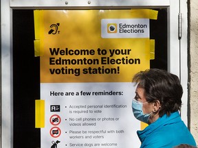 Edmontonians wait to vote at an advance polling station on Oct. 4, 2021. In addition to voting in municipal elections across the province, Albertans also voted on preferred Senate candidates and on referendums regarding equalization and year-round Daylight Saving Time.