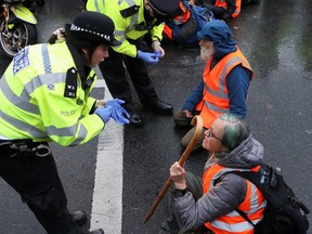 Insulate Britain activists block a motorway junction near Heathrow Airport, in London, Britain, on Oct. 1.