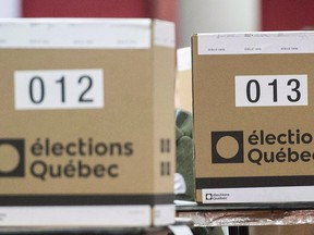Ballot boxes are shown at a polling station in Montreal, Monday, Oct. 1, 2018, on election day in Quebec.