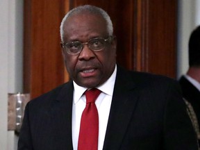 U.S. Supreme Court Associate Justice Clarence Thomas arrives for the ceremonial swearing in of Associate Justice Brett Kavanaugh at the White House on Oct. 8, 2018 in Washington, DC.