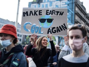 Protesters take part in a demonstration against climate change in Brussels on Oct. 10, ahead of the COP26 climate summit planned for Glasgow starting Oct. 31.