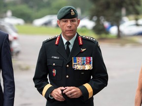 Maj.-Gen. Dany Fortin arrives to be processed at the Gatineau Police Station in Gatineau, Que., on Wednesday, Aug. 18, 2021. THE CANADIAN PRESS/Justin Tang