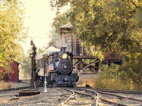 A steam-engine train runs down “The Movie Railroad” in Jamestown, Tuolumne County.