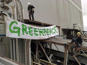Greenpeace Canada activists protest at Suncor’s oilsands upgrader in 2009. The organization was found to have received $1.4 million in foreign funds, between 2000 and 2018-19, per the Allan report released Thursday in Edmonton.