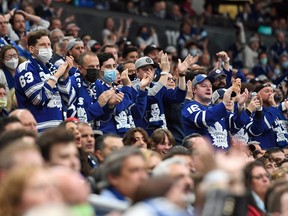 A full house of Toronto Maple Leafs fans at Scotiabank Arena applaud their team as they play the Montreal Canadiens on Oct 13, 2021.