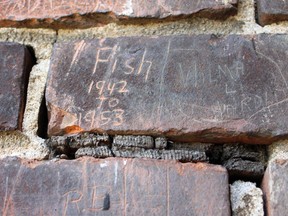 A survivor of the former Mohawk Institute Residential School has carved his name and dates of attendance into one of its  bricks.
