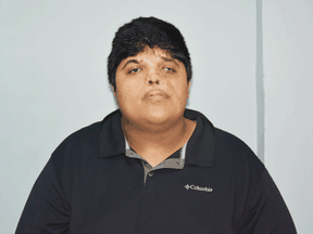 Rakesh David in a mug shot from police in Trinidad and Tobago after his arrest for multiple murders.