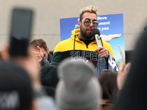 Chris Sky speaks at an anti-restrictions rally in Winnipeg in April. He said on Twitter that police officers from across Ontario plan to attend a protest he's organizing Saturday in London against London police's vaccination policy that could lead to termination for officers who don't get vaccinated for COVID-19. (Kevin King/Postmedia Network)