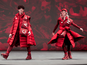 Paul Poirier and Piper Gilles model lululemon athletica's new Team Canada uniforms for the Beijing 2022 Winter Olympics in Toronto on October 26, 2021.