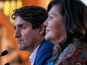 Prime Minister Justin Trudeau pauses for a moment as he listens to Chief Rosanne Casimir as she speaks at the TkÕemlups the Sewepemc in Kamloops, B.C., Oct. 18, 2021.