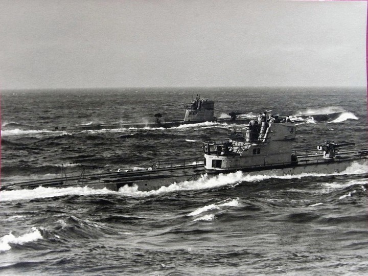  A 1943 photo of U-518 (the vessel in the foreground).