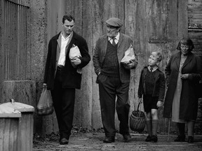 Jamie Dornan at left, with Ciaran Hinds, Jude Hill and Judi Dench in Belfast.