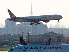 Air India flight 187 from New Delhi lands at Pearson Airport in Toronto on April 23.
