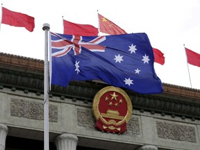 The Australian flag flutters in front of the Great Hall of the People during a welcoming ceremony for Australian Prime Minister Malcolm Turnbull, in Beijing in 2016.