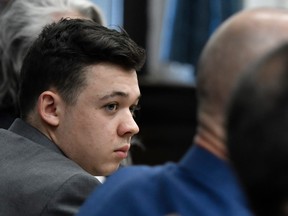 Kyle Rittenhouse listens as attorneys discuss the potential for a mistrial during Rittenhouse's trial at the Kenosha County Courthouse on Nov. 17, 2021 in Kenosha, WI.