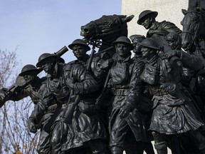 Granite sculpture of soldiers from the First World War on the cenotaph of the National War Memorial, Tuesday, Nov. 9, 2021.