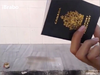 Safwan Al-Kanadi pictured destroying his Canadian passport in a 2014 ISIL propaganda video.