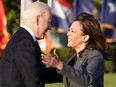 Kamala Harris and Joe Biden hug during a signing ceremony for H.R. 3684, the Infrastructure Investment and Jobs Act at the White House on Nov. 15.