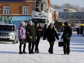 Relatives of dead miners near the Listvyazhnaya coal mine on Nov. 26, 2021.