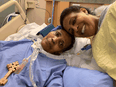 Amaresh Tesfamariam, left, and her sister Azeb Tesfamariam at Toronto's Michael Garron Hospital in August 2021. Amaresh, one of 26 people run down in Toronto’s van attack in 2018, was left bedridden and died Oct. 28.
