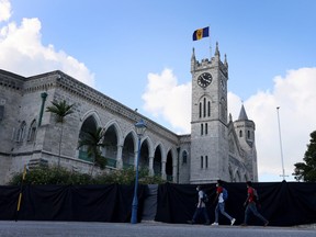 The Barbados flag flies above the parliament buildings on November 16, 2021 in Bridgetown, Barbados.