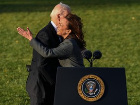 U.S. Vice President Kamala Harris hugs President Joe Biden, as Biden prepares to deliver remarks during the signing ceremony for the Infrastructure Investment and Jobs Act at the White House on November 15, 2021 in Washington, DC.  (Photo by Kenny Holston/Getty Images)