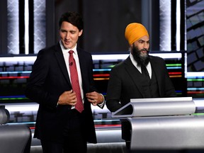 Prime Minister Justin Trudeau, left, and NDP Leader Jagmeet Singh take part in the federal election English-language leaders debate in Gatineau, Que., on Sept. 9.