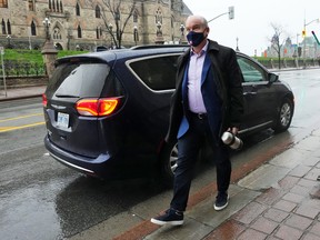 Conservative leader Erin O'Toole arrives at a Conservative caucus meeting in Ottawa on Thursday, Nov. 18, 2021.