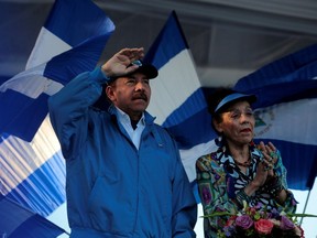 In a file photo, Nicaraguan President Daniel Ortega and Vice President Rosario Murillo gesture during a march called "We walk for peace and life. Justice" in Managua, Nicaragua, September 5, 2018. REUTERS/Oswaldo Rivas