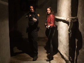 Careful where you point those: Avan Jogia and Kaya Scodelario in Resident Evil: Welcome to Raccoon City.