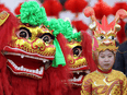 Performers in Beijing prepare to celebrate the Year of the Dragon in 2012. Demographer Daniel Goodkind traces the Dragon baby boom back to just 1976, despite the thousands-year history of the Chinese zodiac.