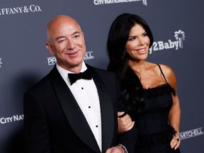 Jeff Bezos (L) and Lauren Sanchez (R) attend the Baby2Baby 10-Year Gala Presented By Paul Mitchell at the Pacific Design Center on November 13, 2021 in West Hollywood, California.