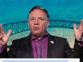 Quebec Premier Francois Legault asked the Liberals for a national handgun bun after a 16-year-old boy was recently killed. THE CANADIAN PRESS/Jacques Boissinot
