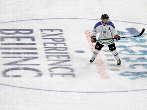 Xu Xiaotian from the Capital University of Physical Education and Sports skates at the Wukesong Sports Centre in Beijing, China, November 8, 2021.