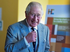 Britain's Prince Charles smiles during his visit to Homerton College at the University of Cambridge, in Cambridge, Britain November 23, 2021.