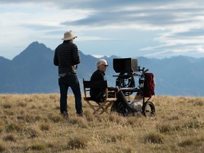 Jane Campion (seated) with assistant director Phil Jones on the set of The Power of the Dog.