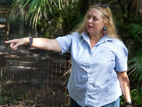 Carole Baskin, founder of Big Cat Rescue, walks the property near Tampa, Fla.