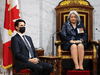 Prime Minister Justin Trudeau, left, looks up after Governor General Mary Simon delivered the throne speech in the Senate in Ottawa, on Nov. 23.