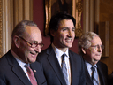 Prime Minister Justin Trudeau stands with Senate Majority Leader Chuck Schumer (D-NY), left, and Senate Minority Leader Mitch McConnell (R-KY) before a meeting at the U.S. Capitol in Washington, DC, November 17, 2021.