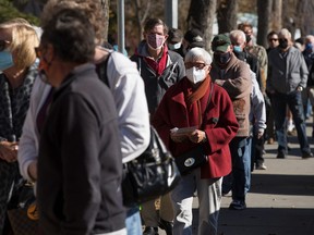 Edmontonians lined up to vote in October municipal elections, which also included a referendum on equalization payments. Photo by David Bloom