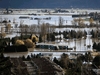 Abandoned transport trucks are seen on the Trans-Canada Highway in a flooded area of Abbotsford, B.C., on Nov. 16, 2021.