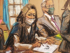 Ghislaine Maxwell, the Jeffrey Epstein associate accused of sex trafficking, makes a sketch of court artists during a pre-trial hearing ahead of jury selection, in a courtroom sketch in New York City, U.S., November 1, 2021.