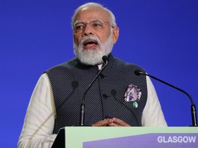India's Prime Minister Narendra Modi speaks during the World Leaders' Summit "Accelerating Clean Technology Innovation and Deployment" session on day three of COP26 on November 02, 2021 in Glasgow, Scotland.
