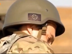 File photo: A news broadcast by German ZDF station showed soldiers of the Ukraine Azov Battalion with nazi symbols on their helmets. PHOTO BY FILES /ZDF station