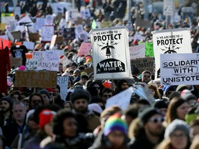 Supporters of the indigenous Wet'suwet'en Nation march as part of a protest against British Columbia's Coastal GasLink pipeline, in Toronto, Ontario, Canada February 17, 2020.