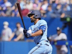 Marcus Semien #10 of the Toronto Blue Jays hits a home run against the Chicago White Sox, on Aug. 26, 2021 in Toronto.