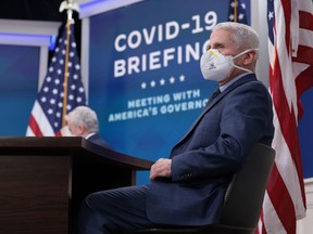 Dr. Anthony Fauci, Director of the National Institute of Allergy and Infectious Diseases and the Chief Medical Advisor to the President, waits for U.S. President Joe Biden to arrive for a video call with the White House Covid-19 Response team and the National Governors Association in the South Court Auditorium at the Eisenhower Executive Office Building on December 27, 2021 in Washington, DC